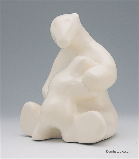 Large image of mother and child polar bear sculpture in carrara white, portrait facing the viewer.