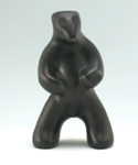 Image of standing polar bear sculpture in diamond black, portrait facing the viewer.