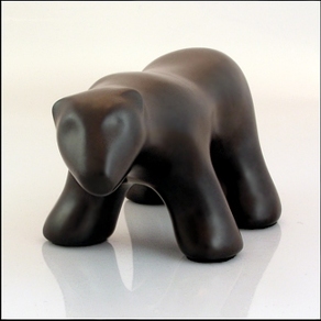 Image of waking polar bear sculpture in diamond black, portrait facing out to the viewer.