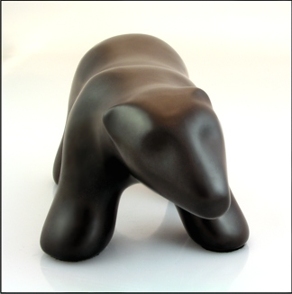 Image of waking polar bear sculpture in diamond black, close-up portrait facing out to the viewer.