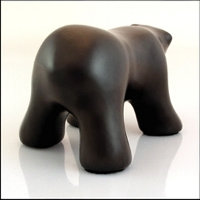 Image of waking polar bear sculpture in diamond black, portrait facing away and to the viewers right.