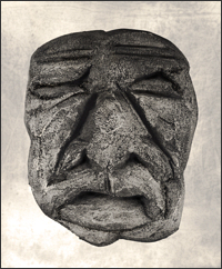 Image of Stucco Man #1 mask facing out to the viewer.