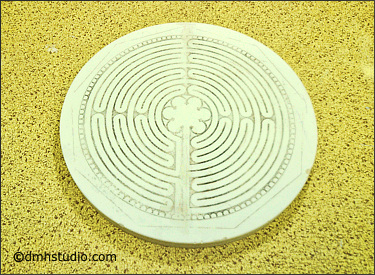 finger labyrinth design transfered to plaster