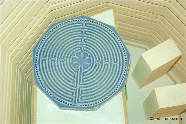 royal blue glaze fired finger labyrinth in the kiln