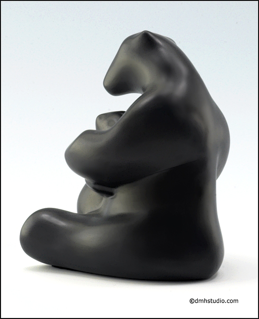 Large image of mother and child black polar bear sculpture in diamond black, portrait facing to the viewers left.