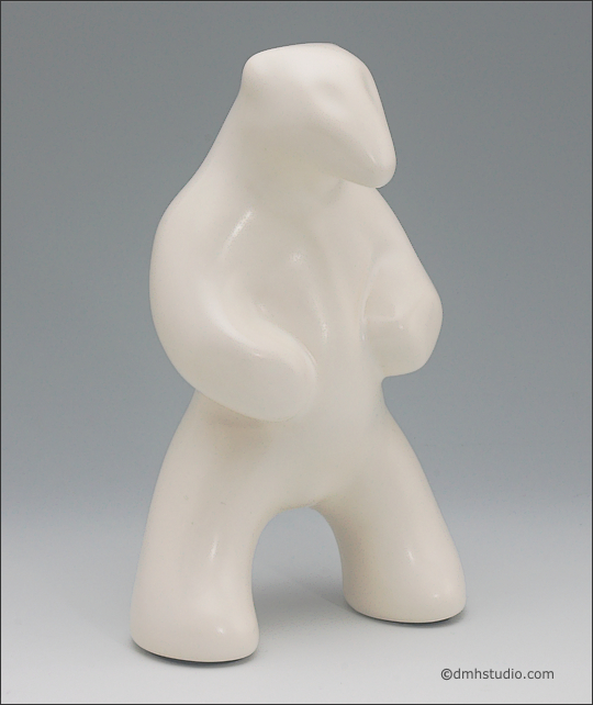 Large image of standing white polar bear sculpture, portrait facing slightly to the viewers right.