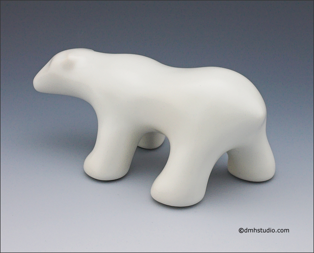 Large image of walking polar bear sculpture in carrara white, 3/4 profile facing away and to the left.
