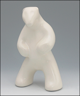 Image of standing polar bear sculpture in carrara white, portrait  facing forward.